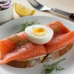 Smoked salmon on pretzel toast hard boiled egg, smoked salmon breakfast, pretzel toast with smoked salmon, salmon and hard-boiled egg toast, salmon brunch ideas, smoked salmon egg recipe